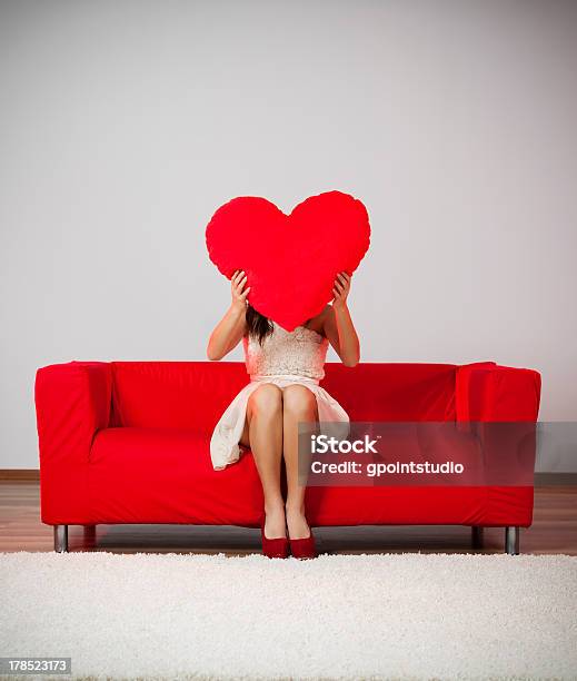 Elegant And Fashion Woman Holding Heart Shape Pillow Stock Photo - Download Image Now