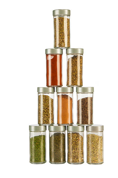 istock colorful powder spices in glass bottle 178523867