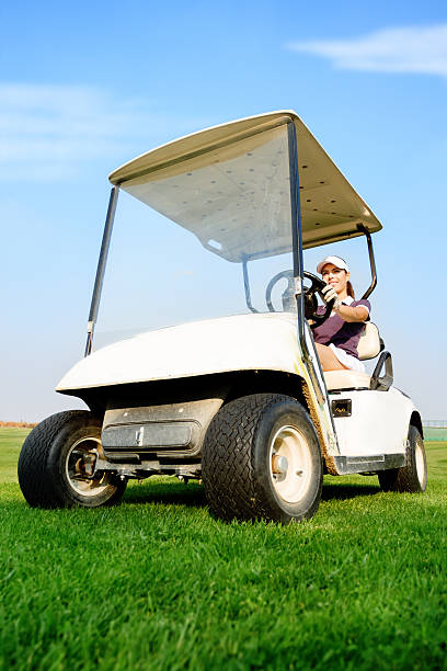 istock Woman in golf cart 178524390
