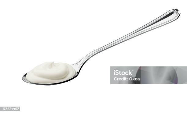 Yogurt On Spoon Stock Photo - Download Image Now - Yogurt, Spoon, Cut Out