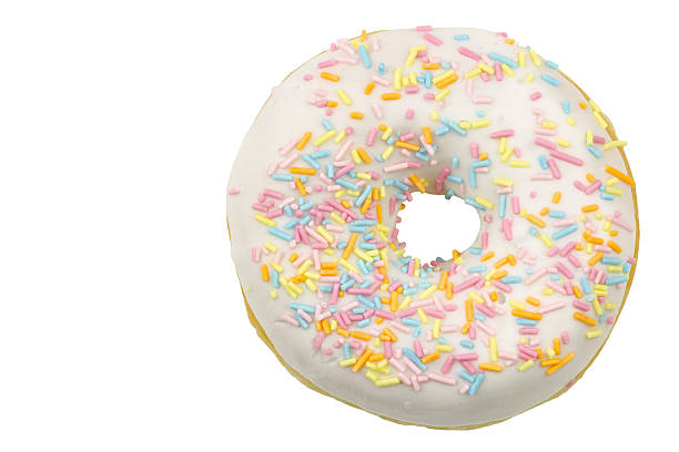 istock white glazed donut with colorful fruit sprinkles 178524682