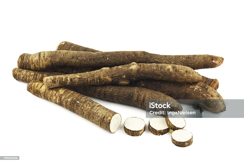 Black salsify Group of black salsify on white. Salsify Stock Photo