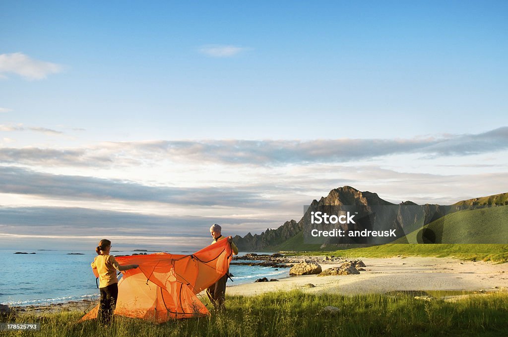 couple with tent couple with tent near seaside Activity Stock Photo