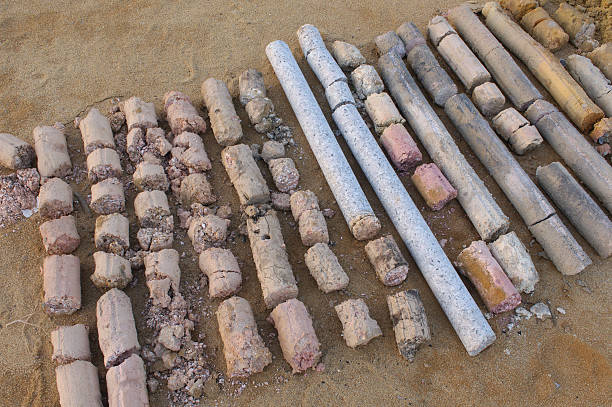 Rows of different soil samples laying on the ground Soil sample display layers have boulder soil sample stock pictures, royalty-free photos & images