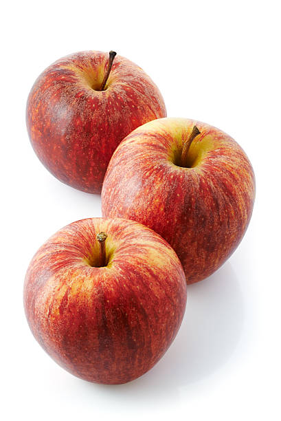 Three red apples stock photo