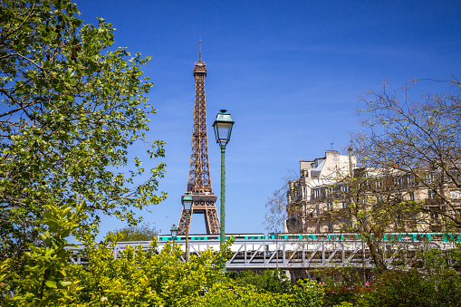 Eiffel Tower and subway on a bridge in Paris, France