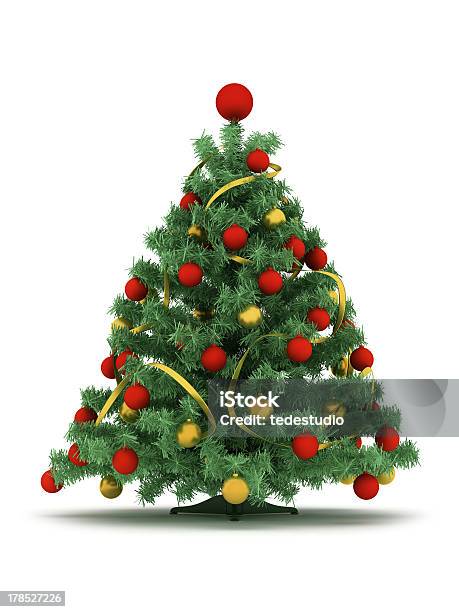 Christmas Tree Decorated With Red And Yellow Baubles Stock Photo - Download Image Now