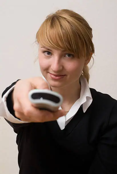 young woman with remote control