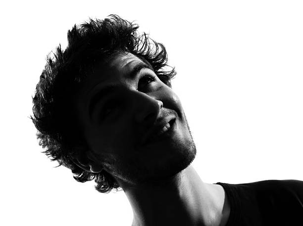istock young man silhouette smiling happy 178527670