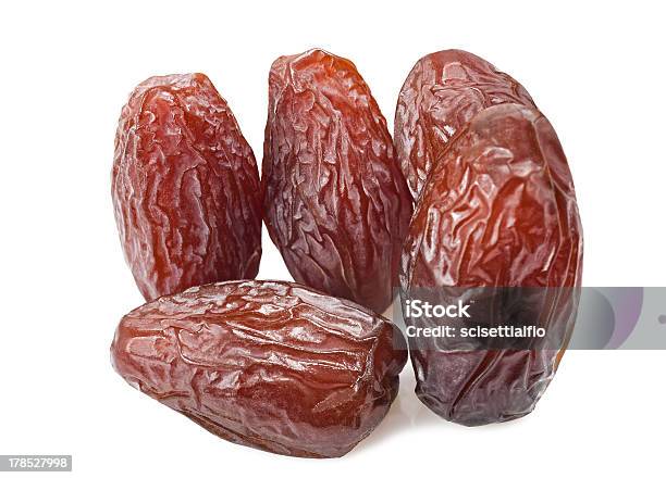 Dried Dates Stock Photo - Download Image Now - Brown, Cut Out, Date - Fruit