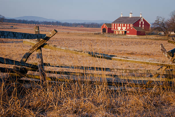 Large Barn with wooden fence in the morning stock photo