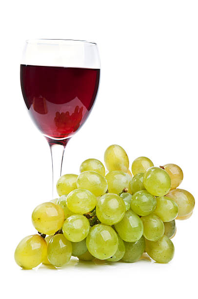 istock one glass of wine and grapes 178528142