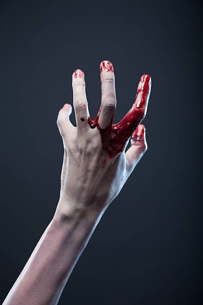 blutigen zombie-hand, extreme body-art - zombie aggression monster indoors stock-fotos und bilder