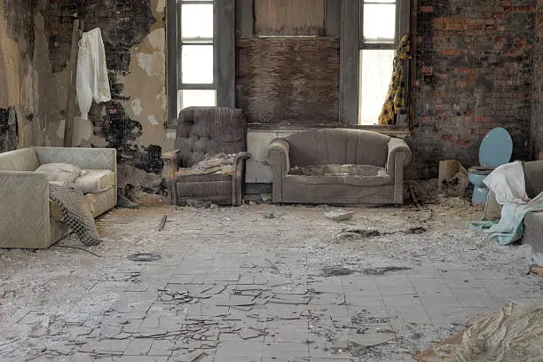 Urbex, abandoned house interior with asbestos tiles. Light HDR processing.