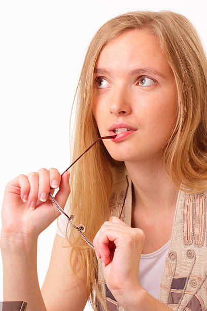 Thoughtful young student woman stock photo