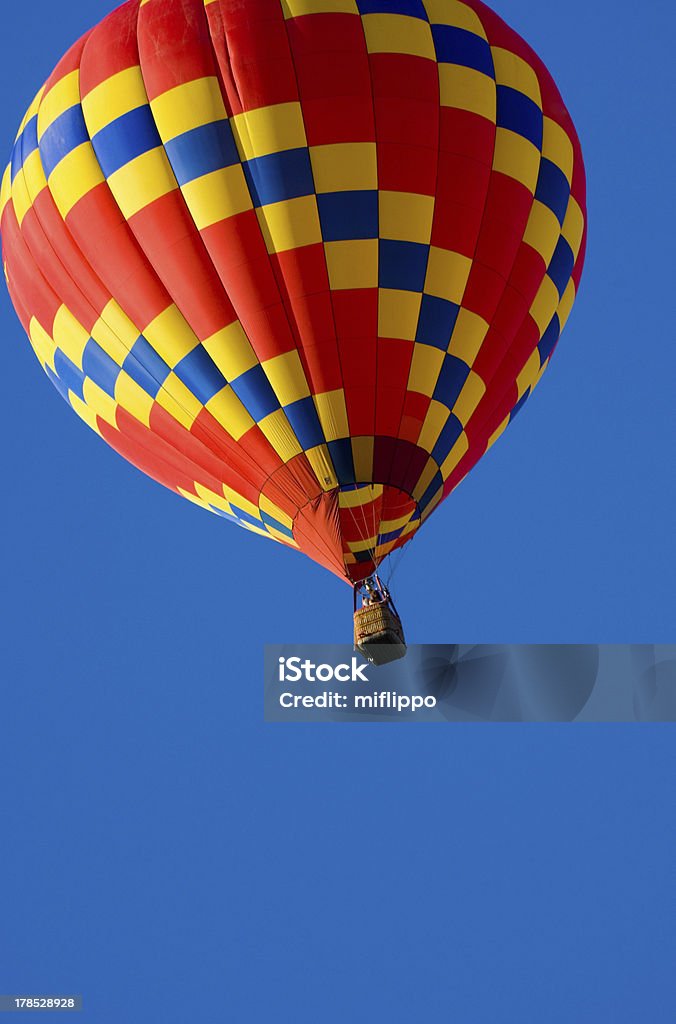 Hot Air Balloon Beautiful hot air balloon against dark blue sky with basket Adventure Stock Photo