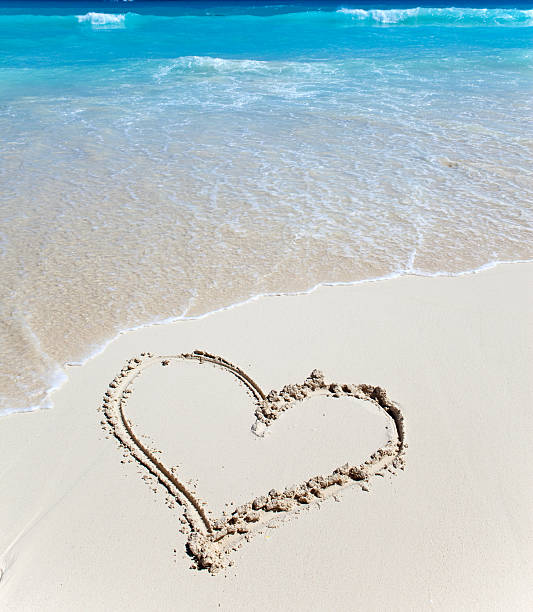istock heart- a picture on sand 178529361