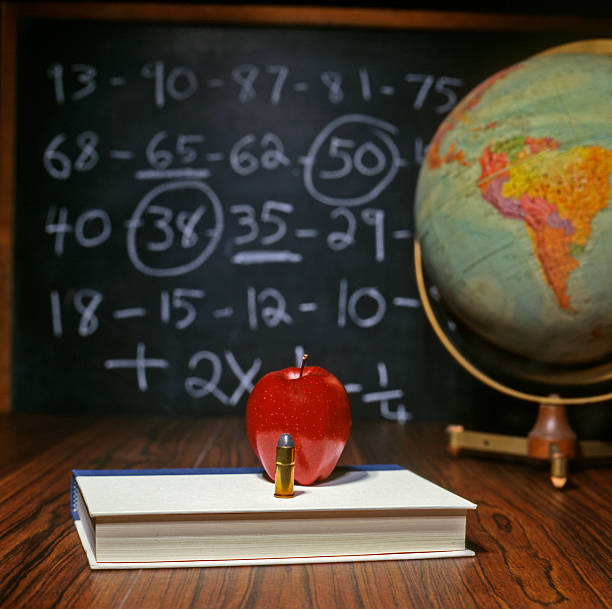 Guns & schools. stock photo