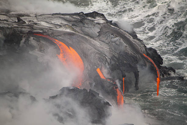 istock Lava erupting into Pacific Ocean in Hawaii 178530144