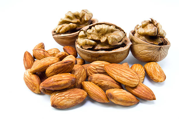 almonds and walnuts stock photo