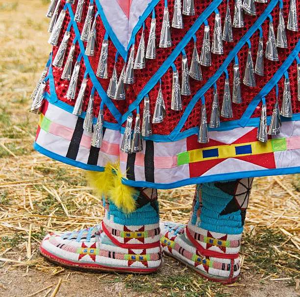 Photo of Native American Indian woman's dress and beaded boots