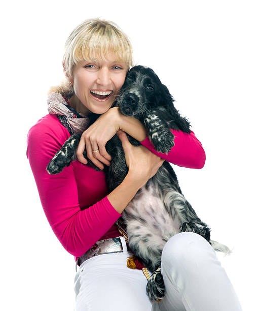istock young woman with her puppy. 178530924