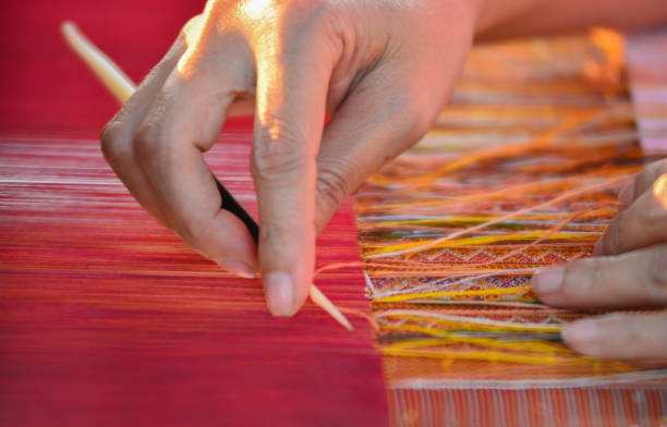 istock Traditional handicraft weaving work by hand 1785311393