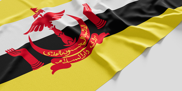 Flag of Brunei. Fabric textured Brunei flag isolated on white background. 3D illustration