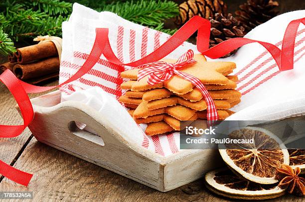 Christmas Gingerbread Cookies In Festive Setting Stock Photo - Download Image Now - Anise, Backgrounds, Baked Pastry Item