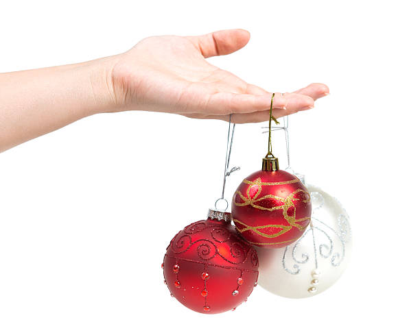 istock Christmas ornaments in a hand 178532603