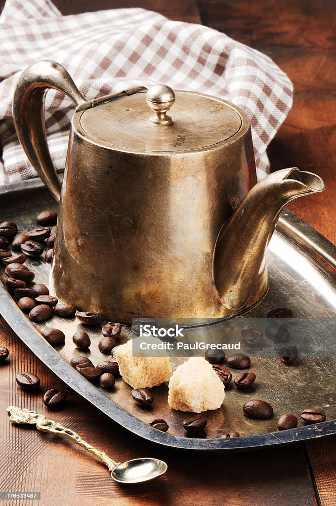 Vintage coffee pot on silver tray Vintage coffee pot on antique silver tray Ancient Stock Photo