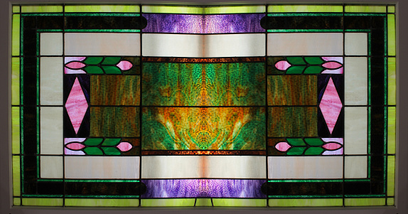 Stained glass style colorful pattern fills in a whole screen.