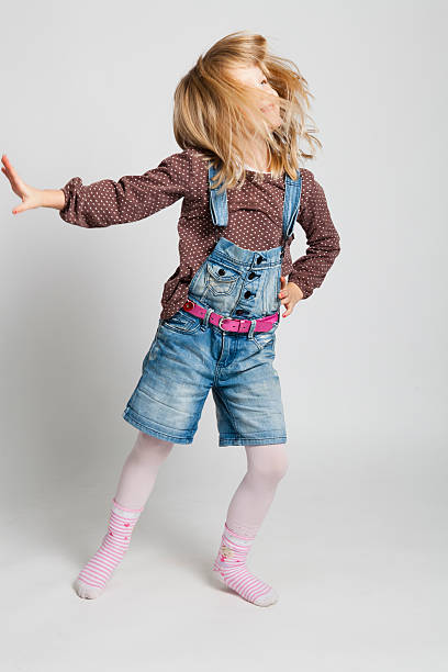 istock Happy young girl dancing 178535082