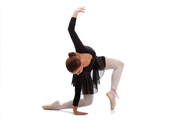 istock Beautiful ballerina making a ballet pose 178535253