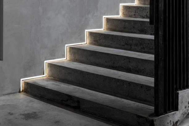 istock Concrete stairs with LED light lines illumination 1785352650