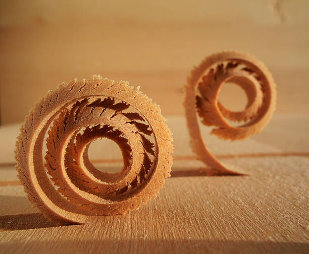 spiral wood shavings stock photo
