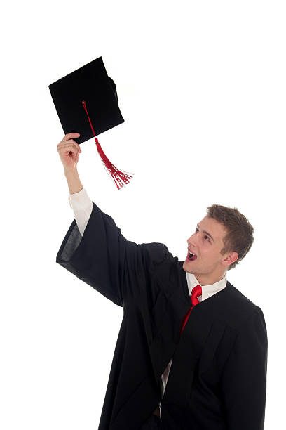 istock Young man tossing up his hat on Graduation Day 178535972
