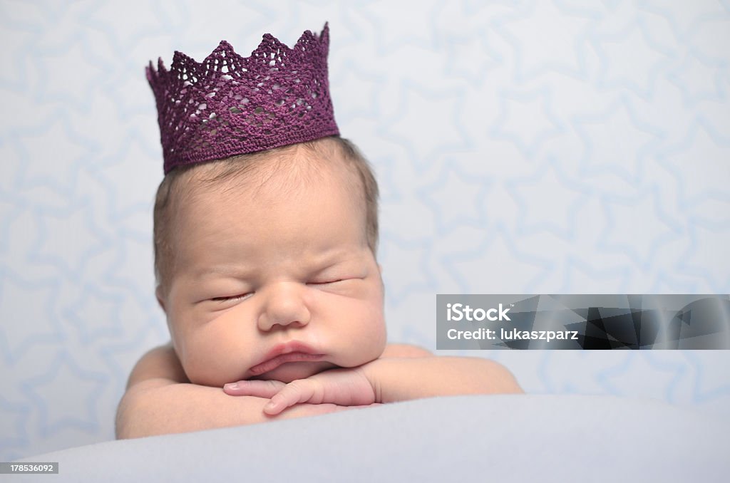 Little baby princess sleeping with stars on the background Little princess Baby - Human Age Stock Photo