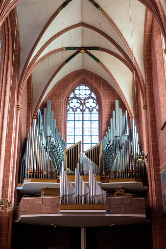 Frankfurt am Main, Germany - August 17, 2023: Front view of the main organ in Frankfurt Cathedral, built in 1957 by Klais as Opus 1109 in the neo-baroque style with a free pipe front.