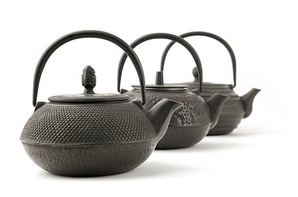 Cast iron teapots stock photo