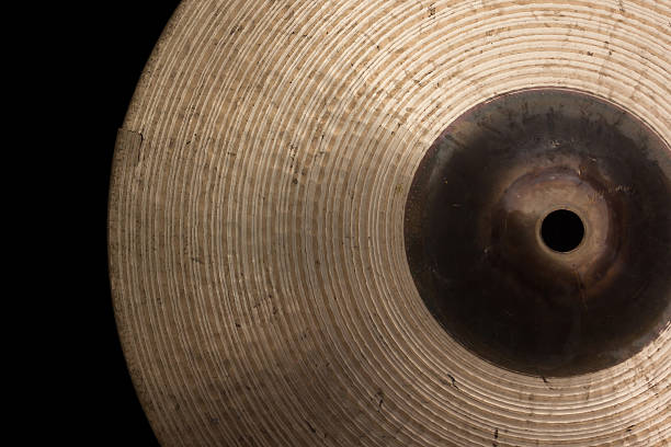 Broken cymbal A broken cymbal over black background. FL-photography stock pictures, royalty-free photos & images