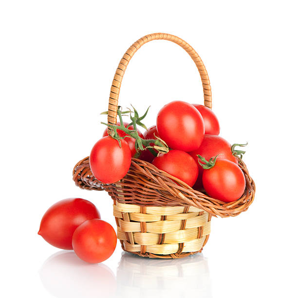 istock Cherry tomatoes in a basket, isolated on white 178538026
