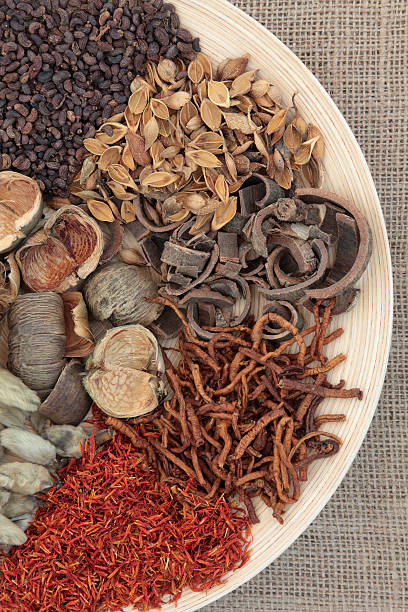 istock Traditional Chinese medicine with herbs on a plate 178538845