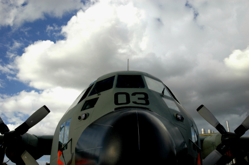 A tight shot of an aircraft nose and propellers