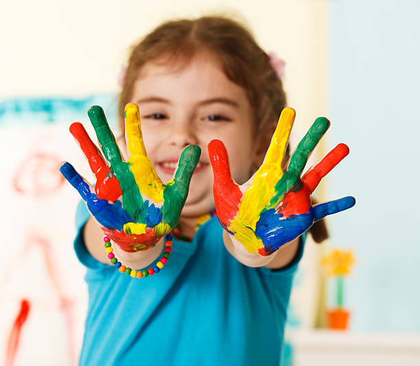 istock Preschooler girl with painted hands 178539471