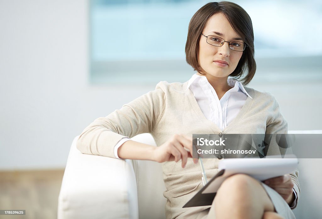 Personal counselor Portrait of a friendly counselor being ready to take notes Adult Stock Photo