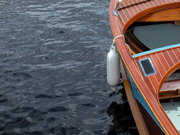 Jetty with moored motorboat.