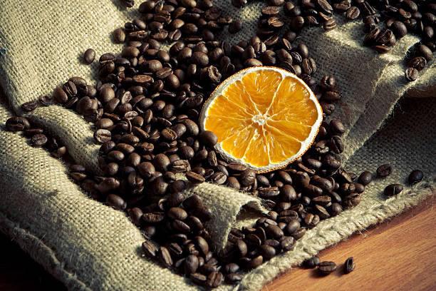 Coffee beans with orange stock photo