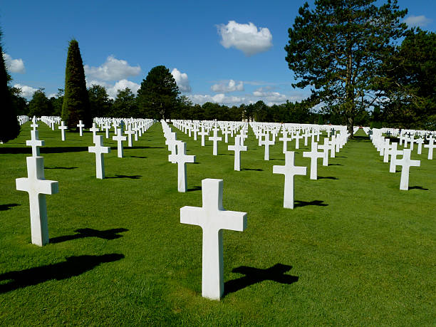 istock cemetery of white crosses 178540160