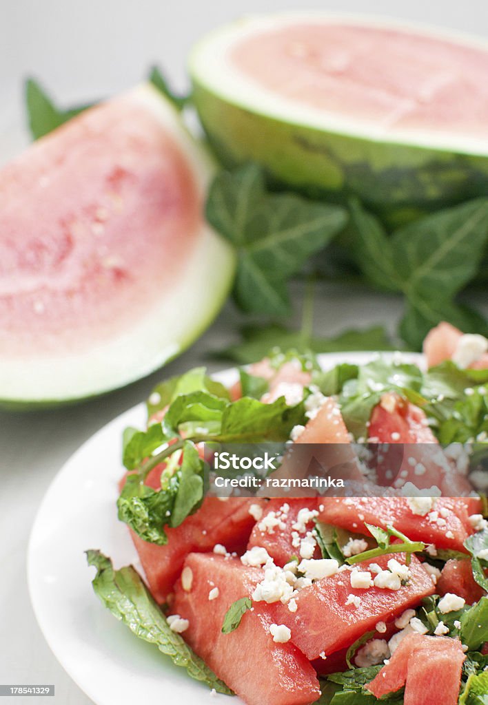 Summer bright watermelon salad closup Summer bright watermelon salad closeup vertical Salad Stock Photo